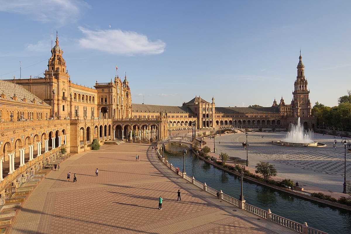 The curved arcades and canal of the Plaza de Espana in Seville
