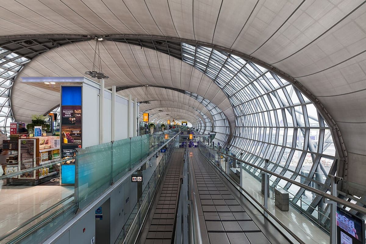 A traveller walkway inside an airport terminal concourse